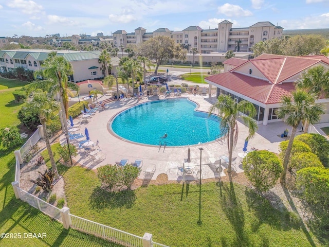 464 Bouchelle Dr Unit 104, New Smyrna Beach, FL 32169 - community pool with fence and a patio area