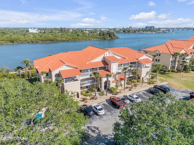 464 Bouchelle Dr Unit 104, New Smyrna Beach, FL 32169 - drone / aerial view featuring a water view