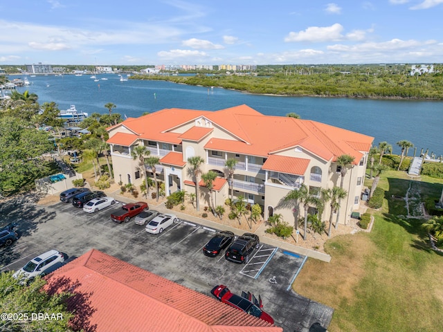 464 Bouchelle Dr Unit 104, New Smyrna Beach, FL 32169 - drone / aerial view featuring a water view