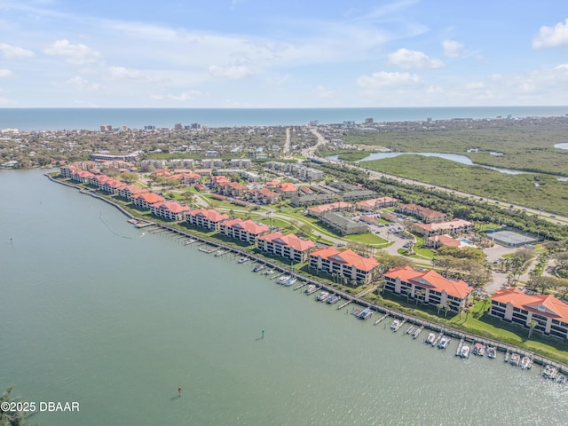 464 Bouchelle Dr Unit 104, New Smyrna Beach, FL 32169 - birds eye view of property with a water view