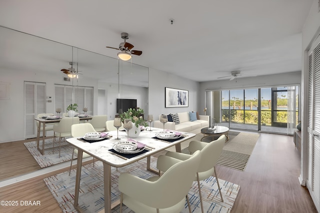 464 Bouchelle Dr Unit 104, New Smyrna Beach, FL 32169 - dining room featuring light wood finished floors and a ceiling fan