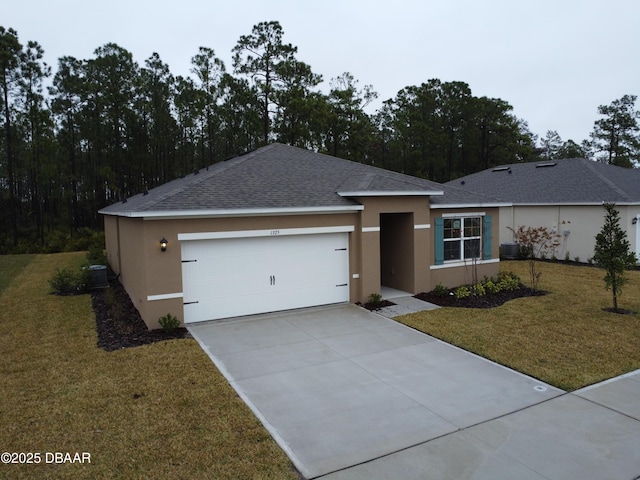 ranch-style house featuring a garage and a front yard