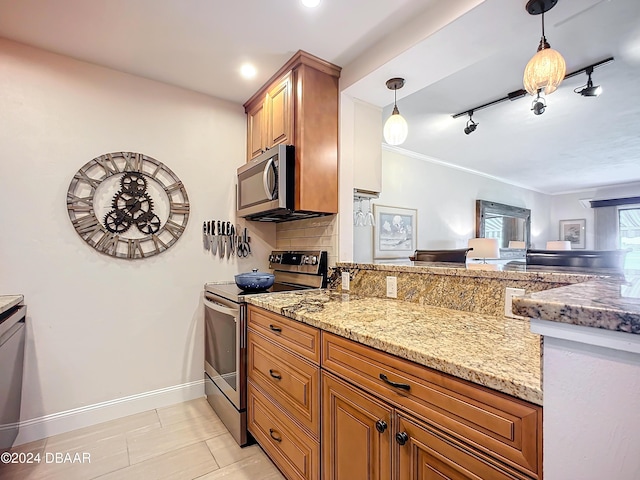 kitchen with appliances with stainless steel finishes, brown cabinetry, and tasteful backsplash