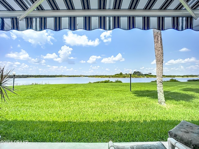 view of yard with a water view