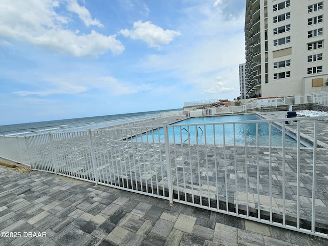 pool featuring a water view