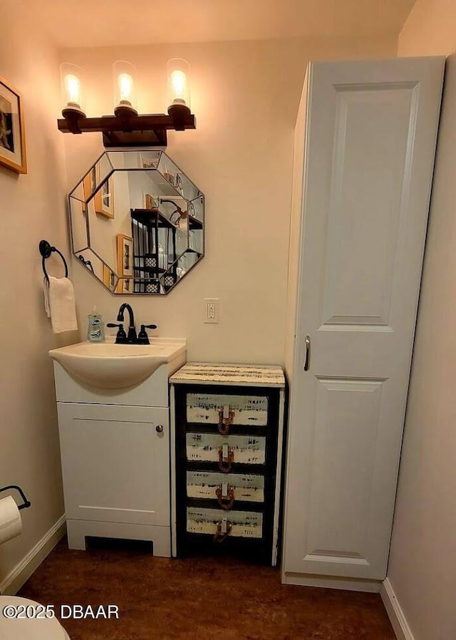 2043 S Atlantic Ave Unit 417, Daytona Beach, FL 32118 - bathroom featuring vanity and baseboards