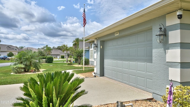 garage featuring driveway