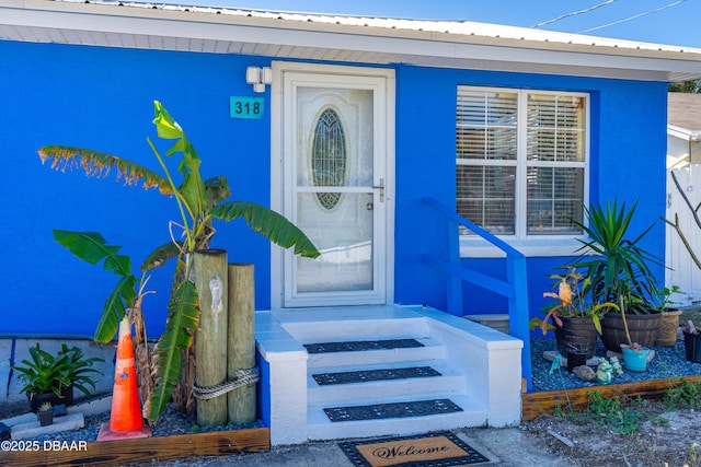 entrance to property with metal roof