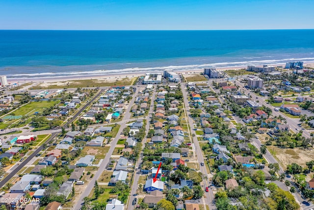 drone / aerial view with a view of the beach and a water view