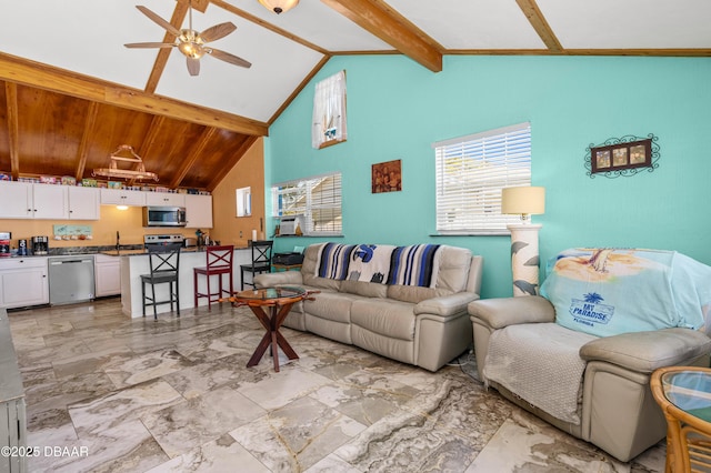 living room with beam ceiling, a healthy amount of sunlight, high vaulted ceiling, and ceiling fan