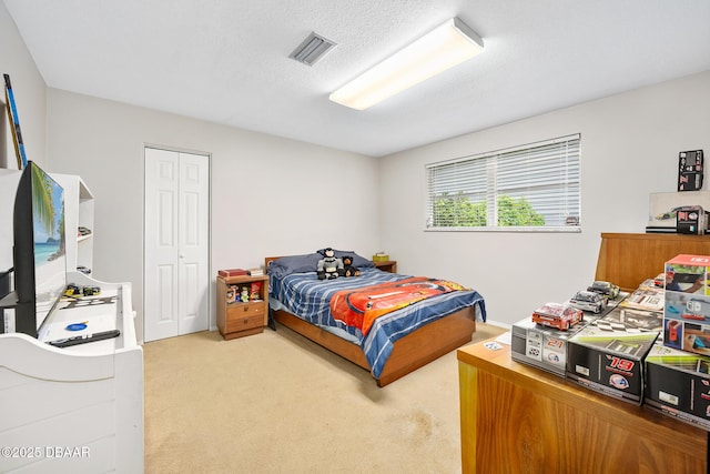 49 Bosarvey Cir, Ormond Beach, FL 32176 - carpeted bedroom with a closet