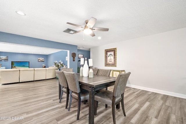 49 Bosarvey Cir, Ormond Beach, FL 32176 - dining room with light wood finished floors and a ceiling fan