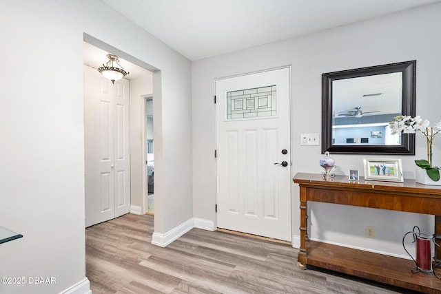 49 Bosarvey Cir, Ormond Beach, FL 32176 - entryway with wood finished floors and baseboards