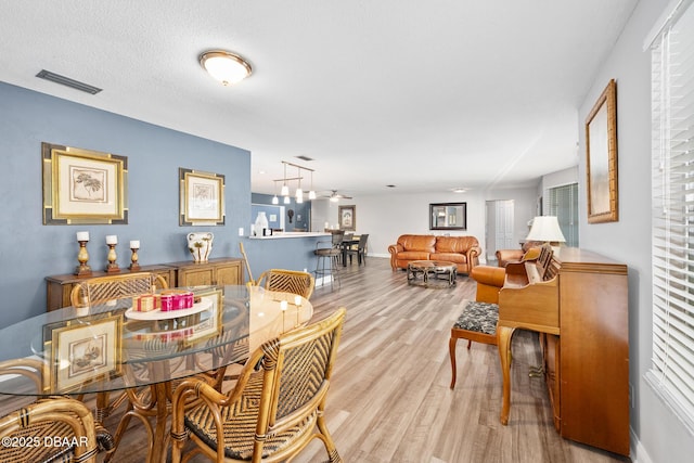 49 Bosarvey Cir, Ormond Beach, FL 32176 - dining area with wood finished floors