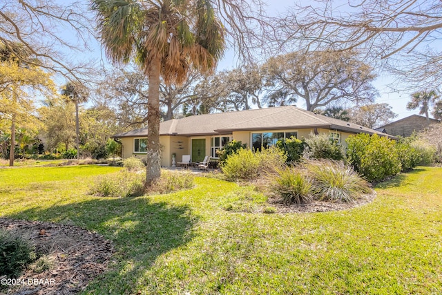 exterior space featuring a front yard