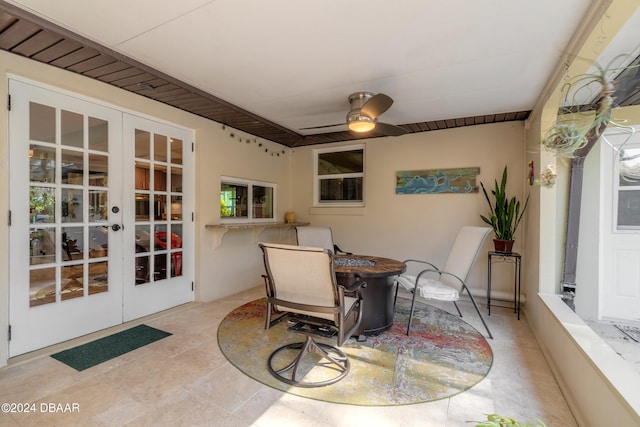 dining area featuring french doors and ceiling fan