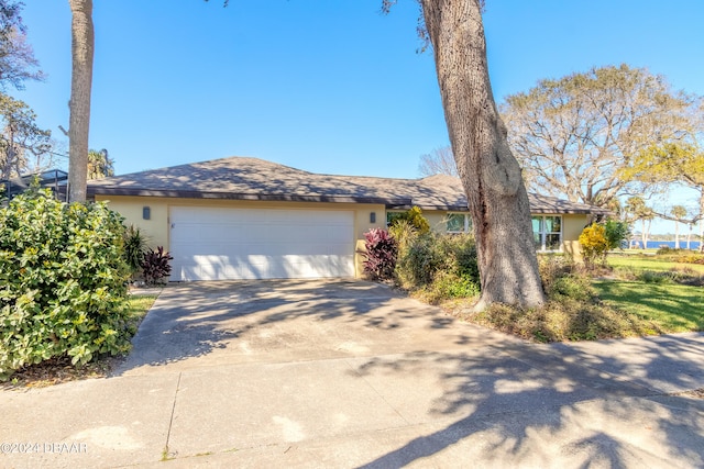 single story home with a garage