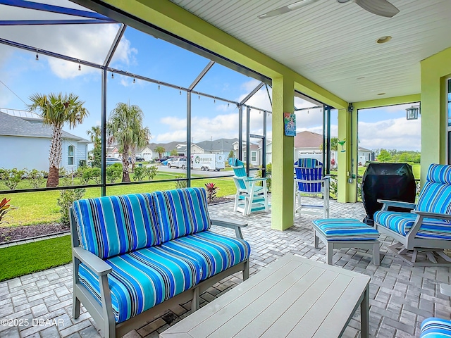 view of patio featuring an outdoor hangout area, ceiling fan, and a lanai