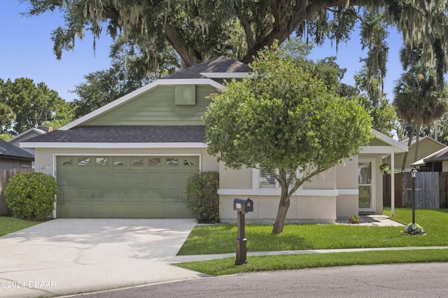 3457 Martingale Ct, Port Orange, FL 32129 - view of front of house with roof with shingles, concrete driveway, an attached garage, and stucco siding