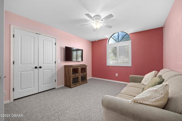 3457 Martingale Ct, Port Orange, FL 32129 - living area with ceiling fan and carpet floors