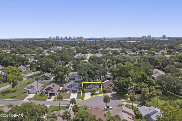 3457 Martingale Ct, Port Orange, FL 32129 - aerial view of residential area with property boundaries highlighted and city skyline