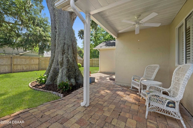 view of patio with ceiling fan