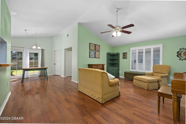 3457 Martingale Ct, Port Orange, FL 32129 - living area with ceiling fan, wood finished floors, a chandelier, and high vaulted ceiling