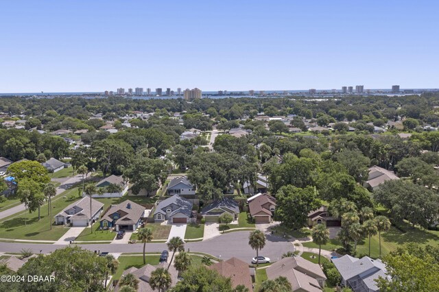 3457 Martingale Ct, Port Orange, FL 32129 - aerial perspective of suburban area with city skyline and a tree filled landscape