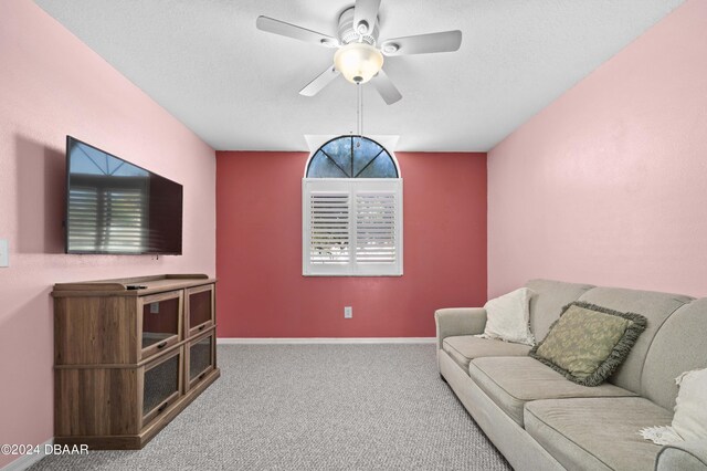 3457 Martingale Ct, Port Orange, FL 32129 - carpeted living room with ceiling fan and baseboards