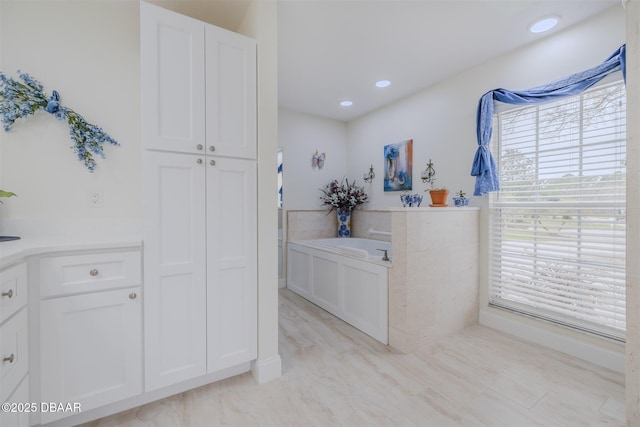 bathroom with a washtub