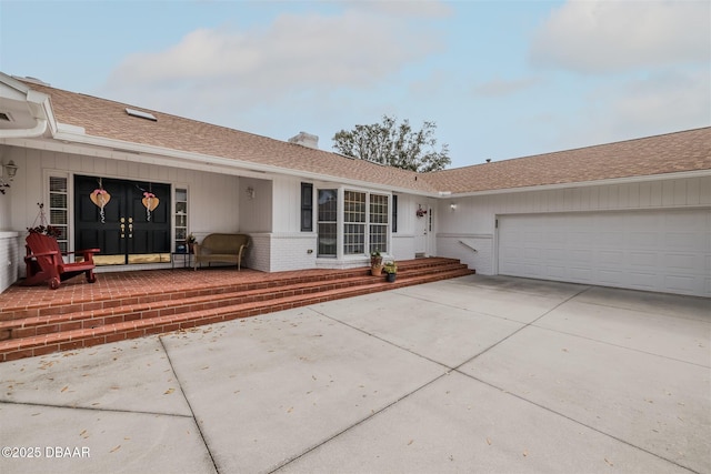 view of front of house with a garage