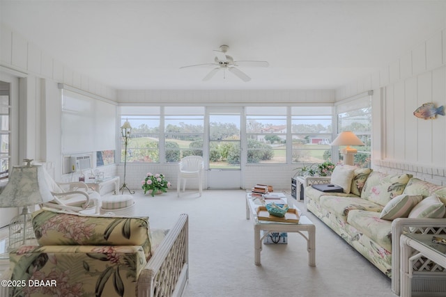 sunroom / solarium featuring cooling unit, ceiling fan, and a wealth of natural light