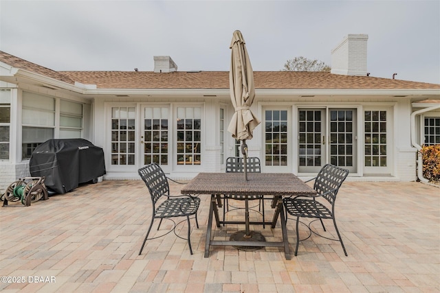 view of patio / terrace with a grill and french doors