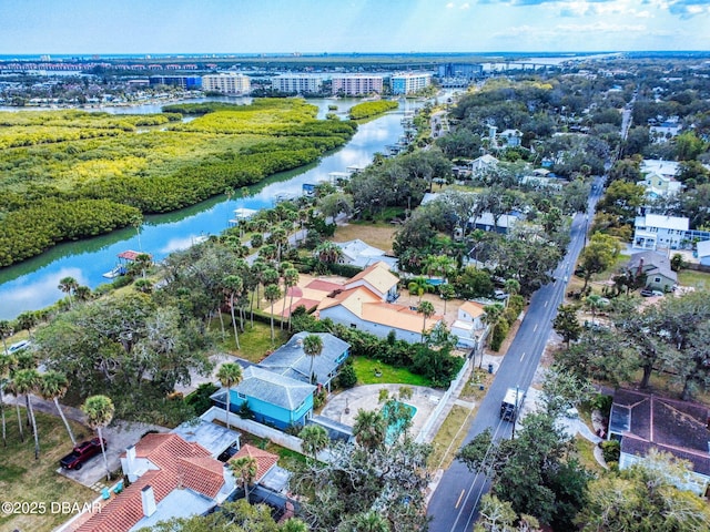 birds eye view of property featuring a water view