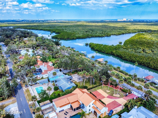 drone / aerial view with a water view