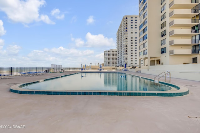 view of pool with a patio