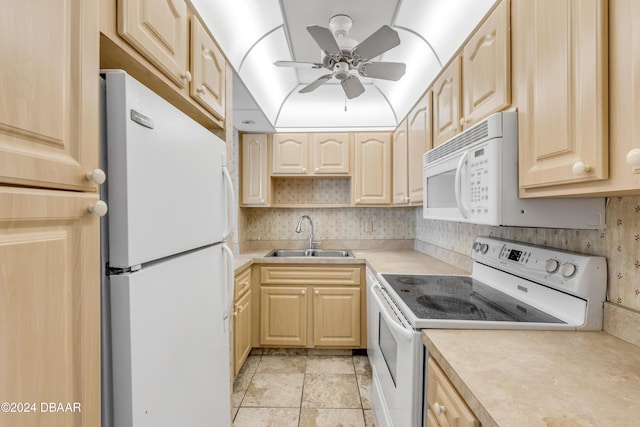 kitchen with ceiling fan, sink, white appliances, light brown cabinetry, and light tile patterned floors