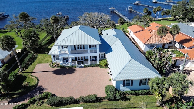 birds eye view of property featuring a water view