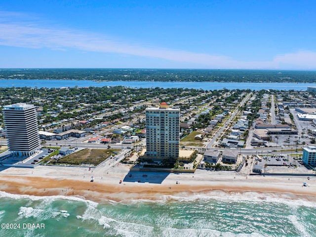 aerial view with a beach view and a water view