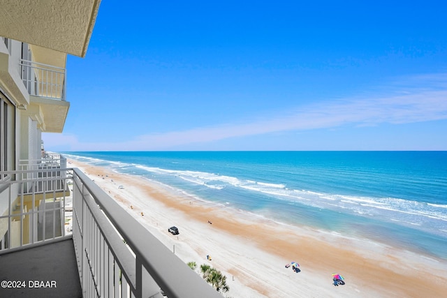 view of water feature with a beach view