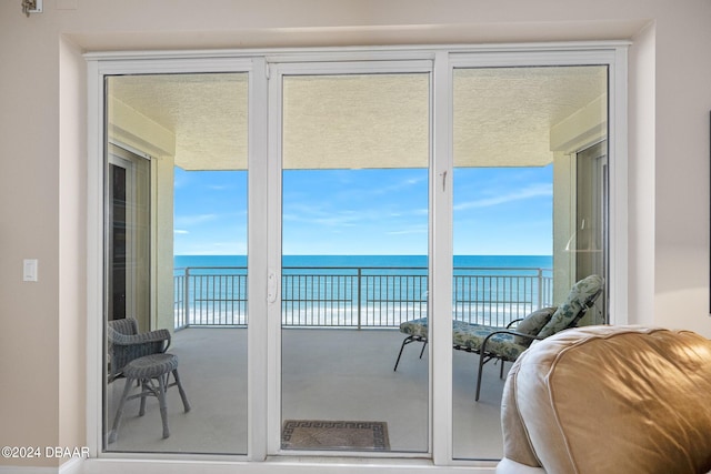 entryway featuring a water view