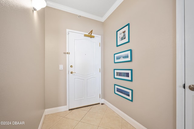 doorway to outside featuring light tile patterned flooring and crown molding