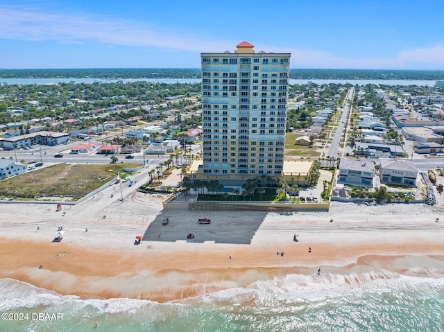 aerial view featuring a beach view and a water view