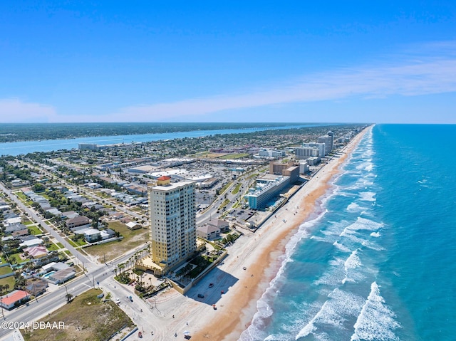 aerial view featuring a beach view and a water view