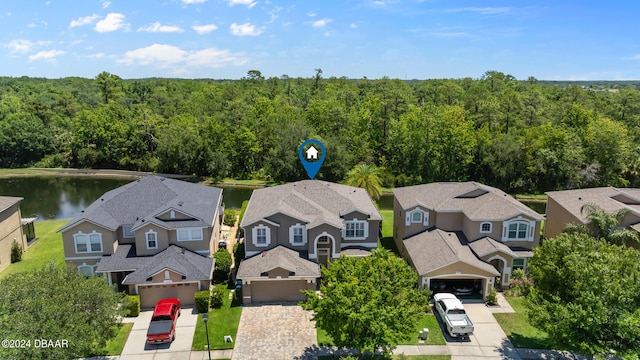 bird's eye view with a water view