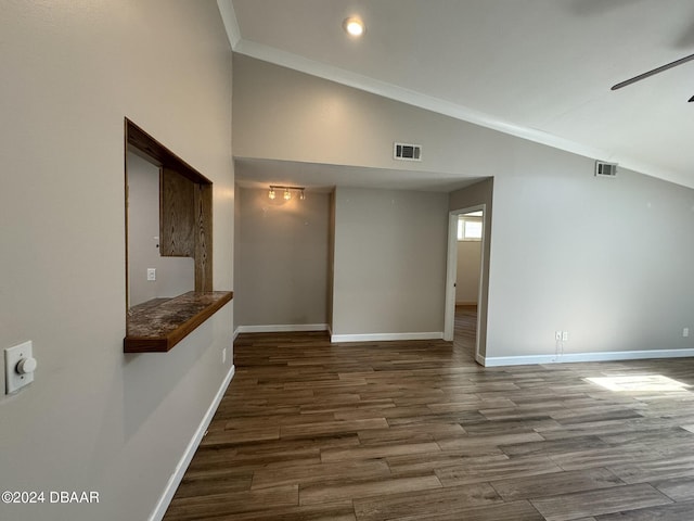 unfurnished room with crown molding, ceiling fan, wood-type flooring, and high vaulted ceiling