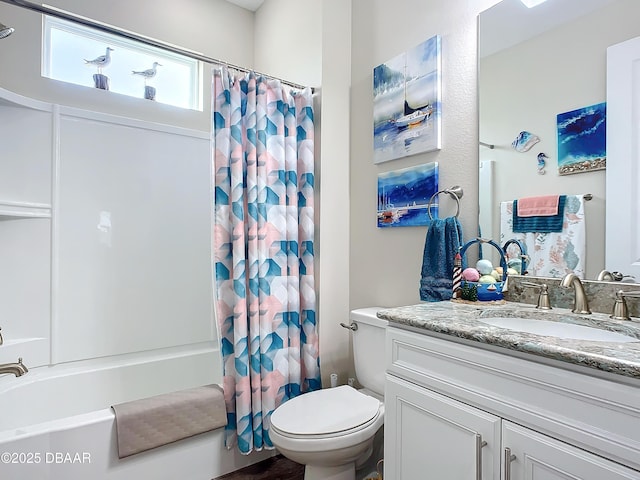 full bathroom with toilet, vanity, and shower / tub combo with curtain