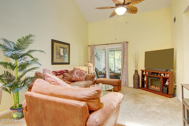 carpeted living room featuring high vaulted ceiling and ceiling fan