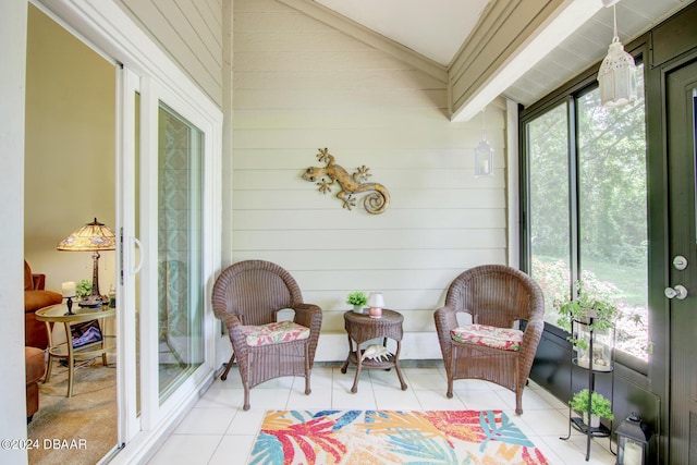 2051 Cornell Pl Unit 26, Port Orange, FL 32128 - sunroom / solarium featuring tile patterned flooring and wood walls