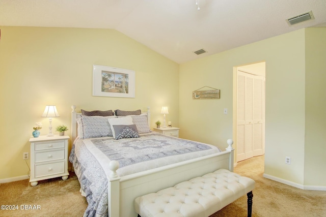 2051 Cornell Pl Unit 26, Port Orange, FL 32128 - bedroom with carpet flooring, lofted ceiling, and a closet